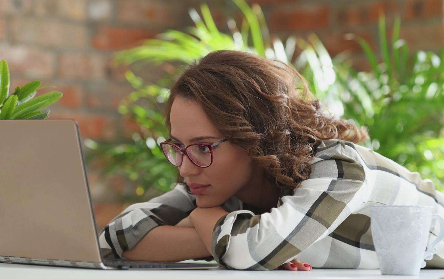 Financial data processing workspace with multiple screens analyzing market trends